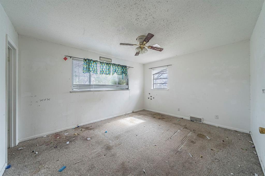 3816 Springbranch Drive Benbrook, TX 76116 - Photo 14 of 27 a view of an empty room with a window