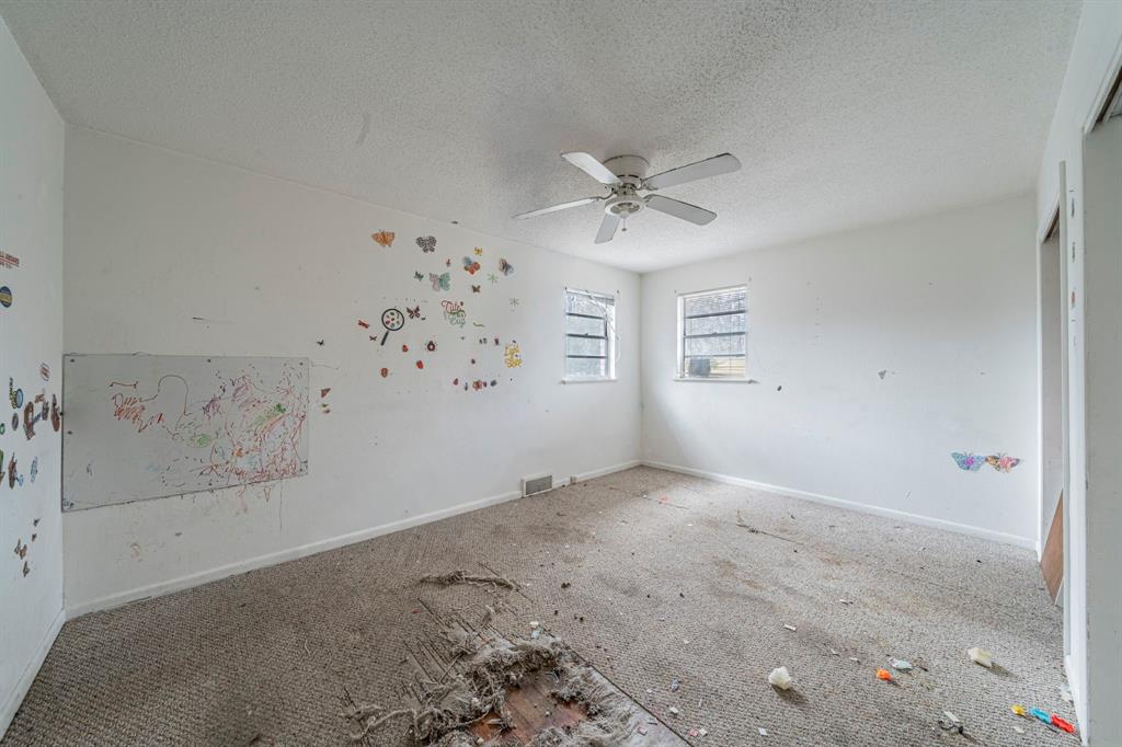 3816 Springbranch Drive Benbrook, TX 76116 - Photo 20 of 27 a view of a big room with a window