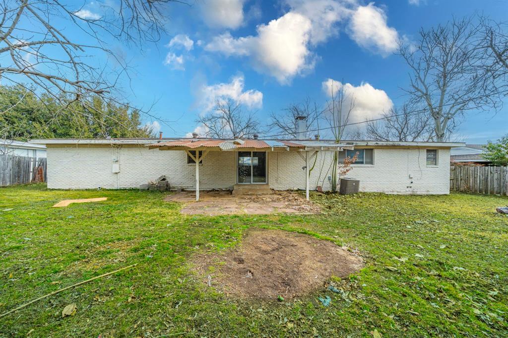 3816 Springbranch Drive Benbrook, TX 76116 - Photo 25 of 27 a view of a house with a backyard