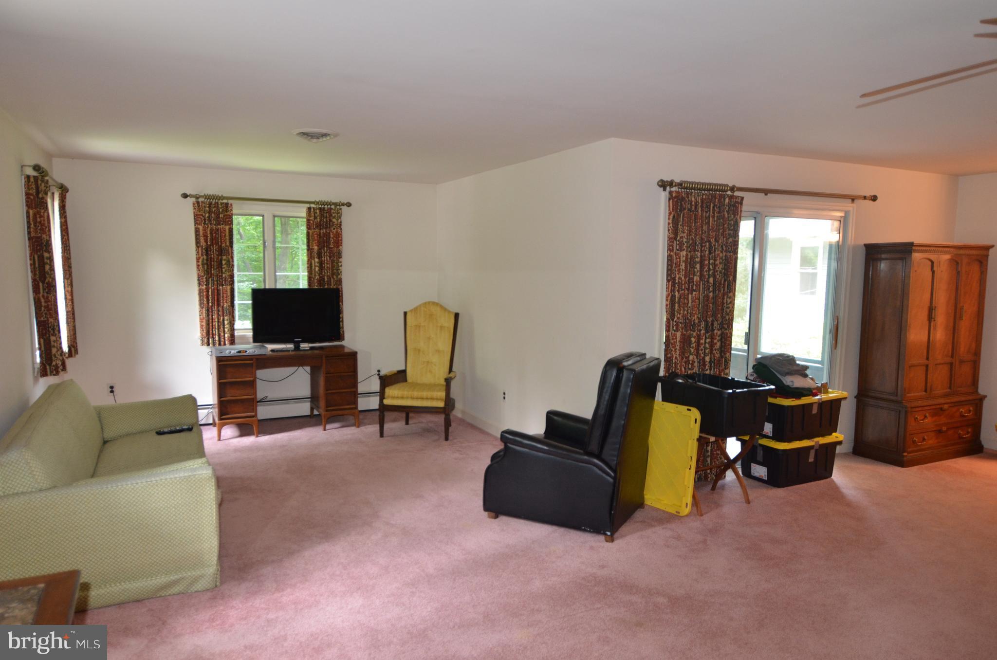 458 Garrison Forest Road Owings Mills, MD 21117 - Photo 10 of 22 Sitting room with sliders to screened porch