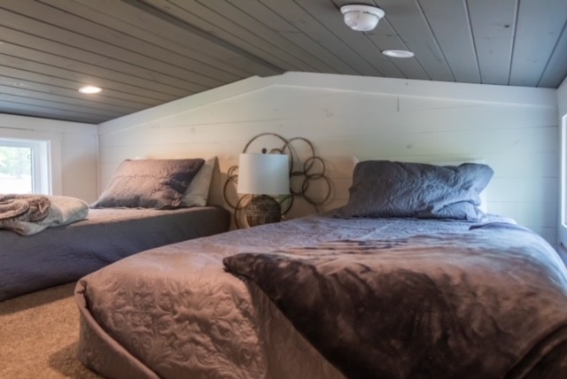 8 Holly Tree Court Monteagle, TN 37356 - Photo 14 of 14 a bedroom with double bed and a couch
