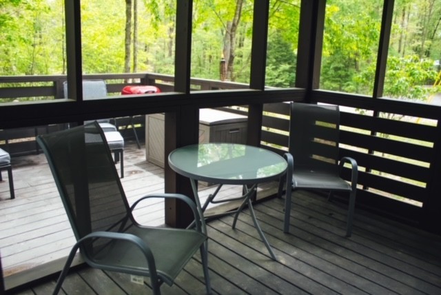 8 Holly Tree Court Monteagle, TN 37356 - Photo 3 of 14 a view of a chairs and table in patio