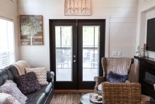 a living room with furniture and a window