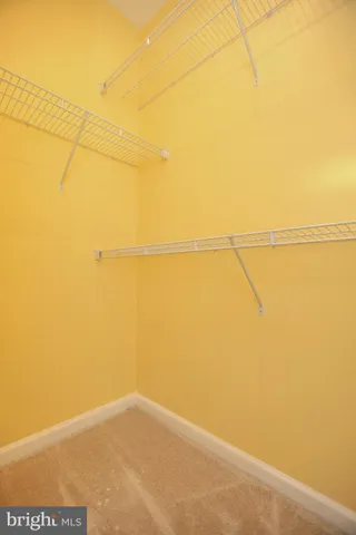 a view of a room with racks on the wall