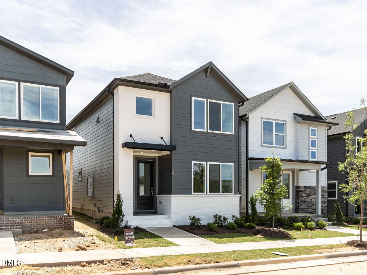 41 Hillway Road Pittsboro, NC 27312 - Photo 2 of 35 a front view of a house with a yard and garage