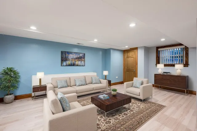 a living room with furniture and a couch