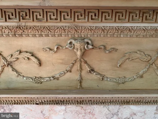 a kitchen with stainless steel appliances granite countertop a sink a stove a refrigerator and cabinets