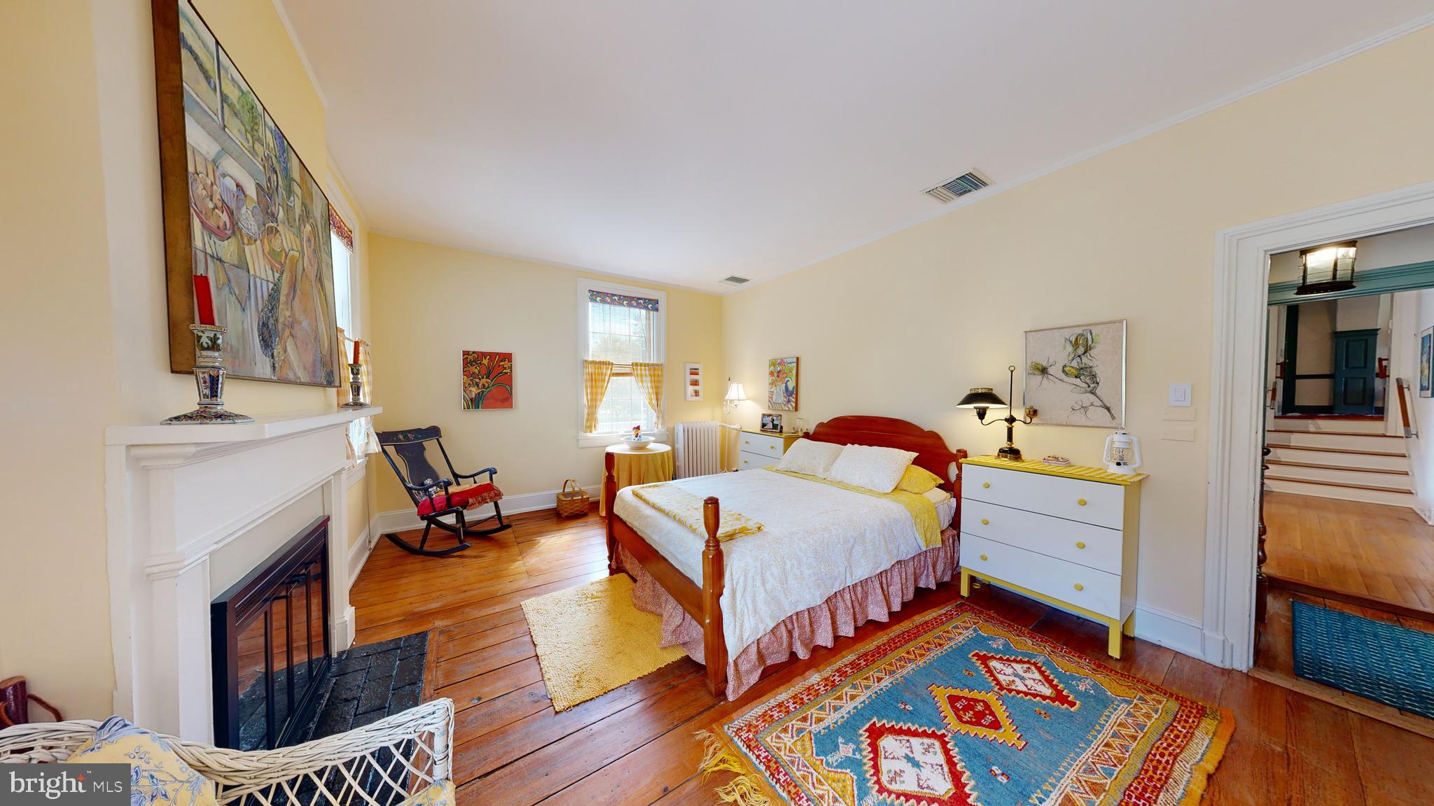 27295 Southside Island Creek Road Trappe, MD 21673 - Photo 25 of 91 a bedroom with furniture and a baby crib