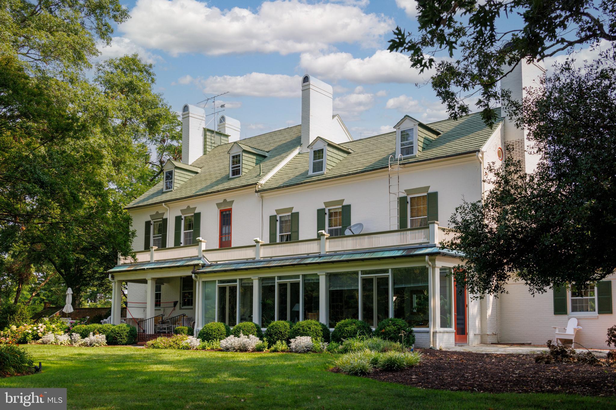 27295 Southside Island Creek Road Trappe, MD 21673 - Photo 37 of 91 a front view of a house with garden