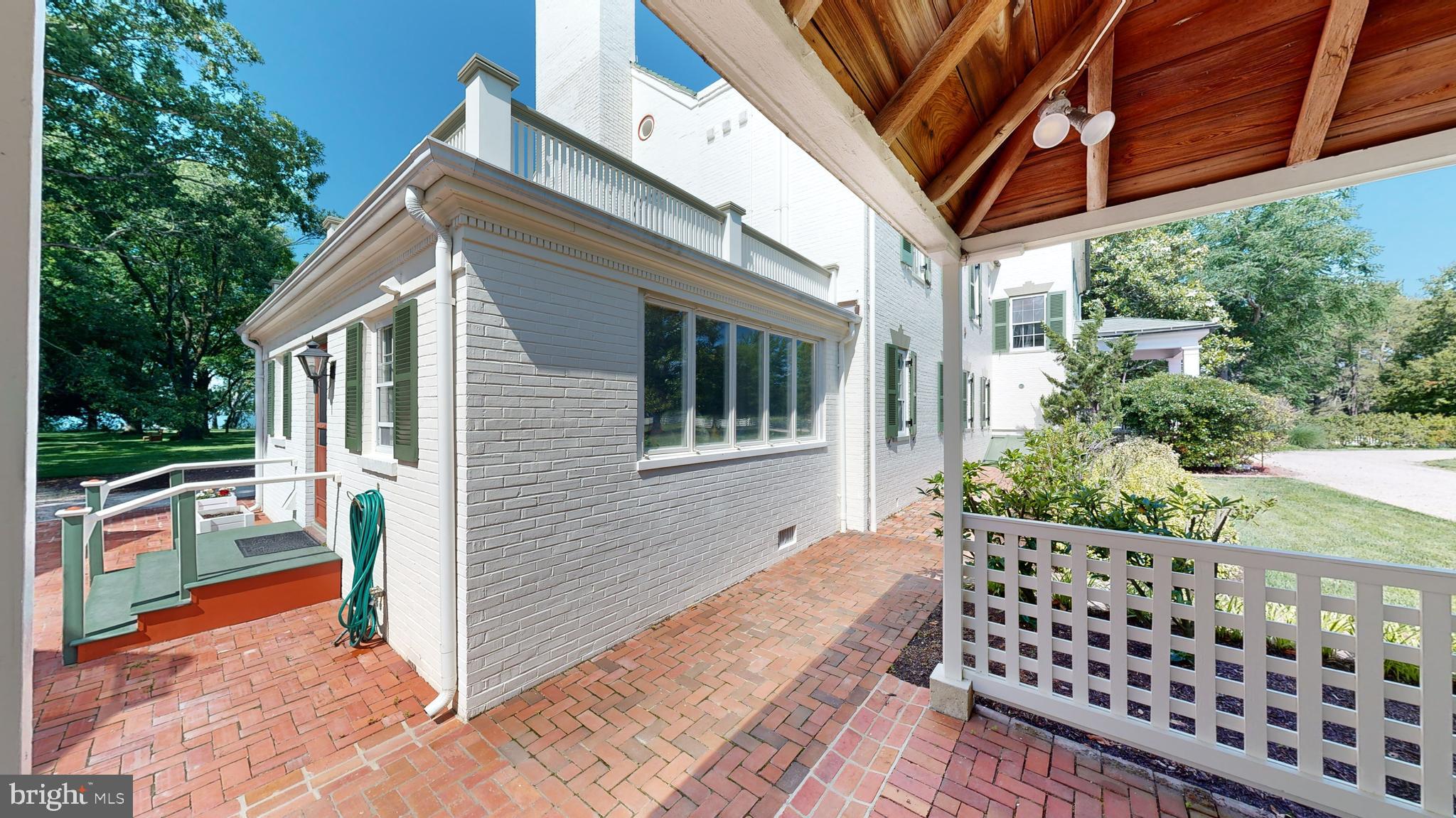 27295 Southside Island Creek Road Trappe, MD 21673 - Photo 41 of 91 a view of a house with backyard and sitting area
