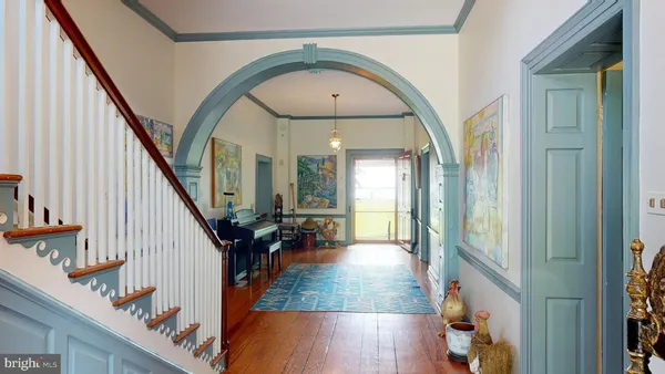 a view of a water heater and a floor to ceiling window