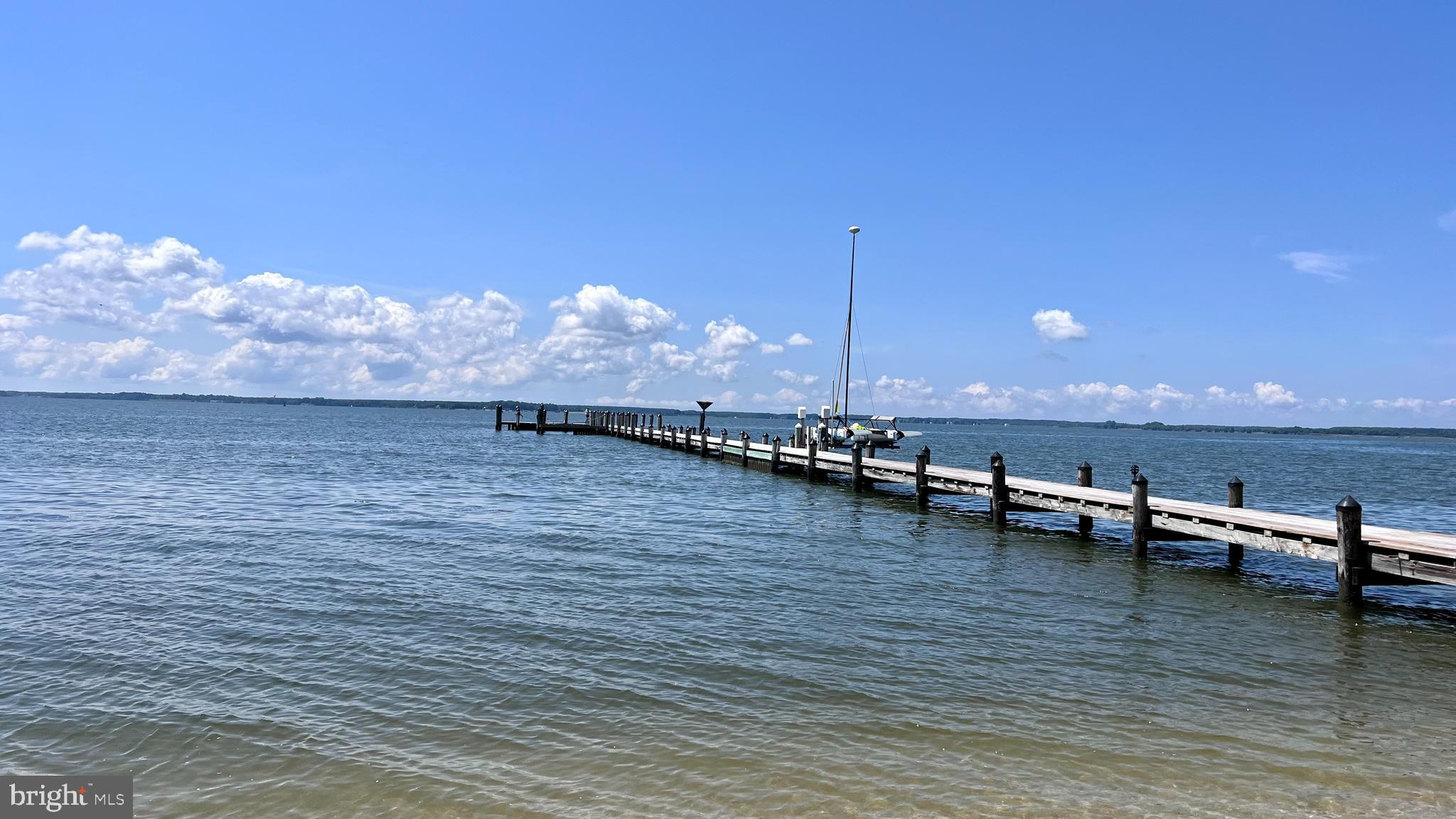 27295 Southside Island Creek Road Trappe, MD 21673 - Photo 61 of 91 a view of a terrace with outdoor seating and city view
