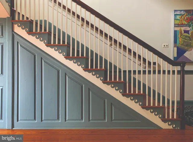 a view of entryway with a flower pot and a wooden floor
