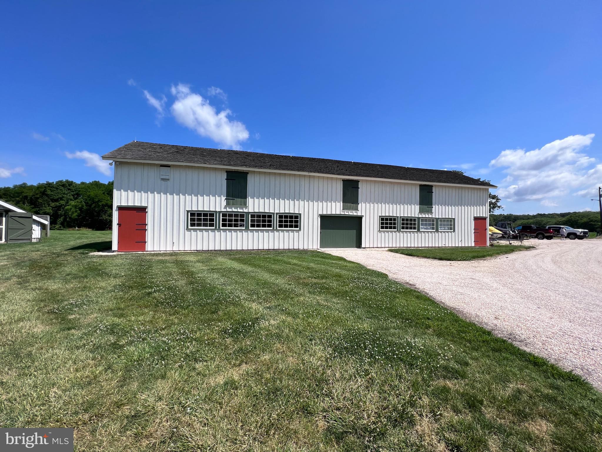 27295 Southside Island Creek Road Trappe, MD 21673 - Photo 77 of 91 a front view of a house with a yard