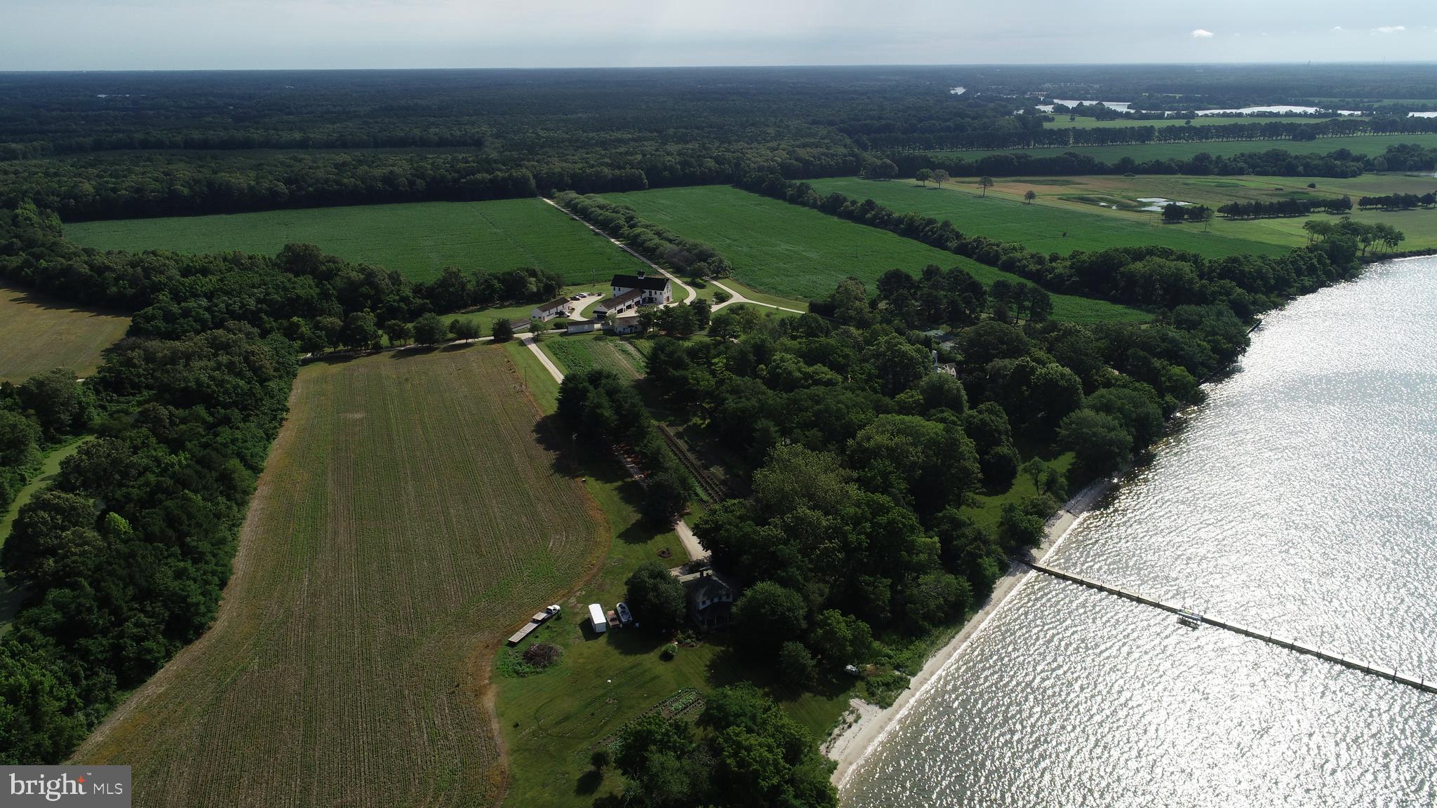 27295 Southside Island Creek Road Trappe, MD 21673 - Photo 80 of 91 a view of a lake with a yard