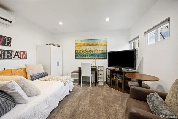 a living room with furniture and a couch