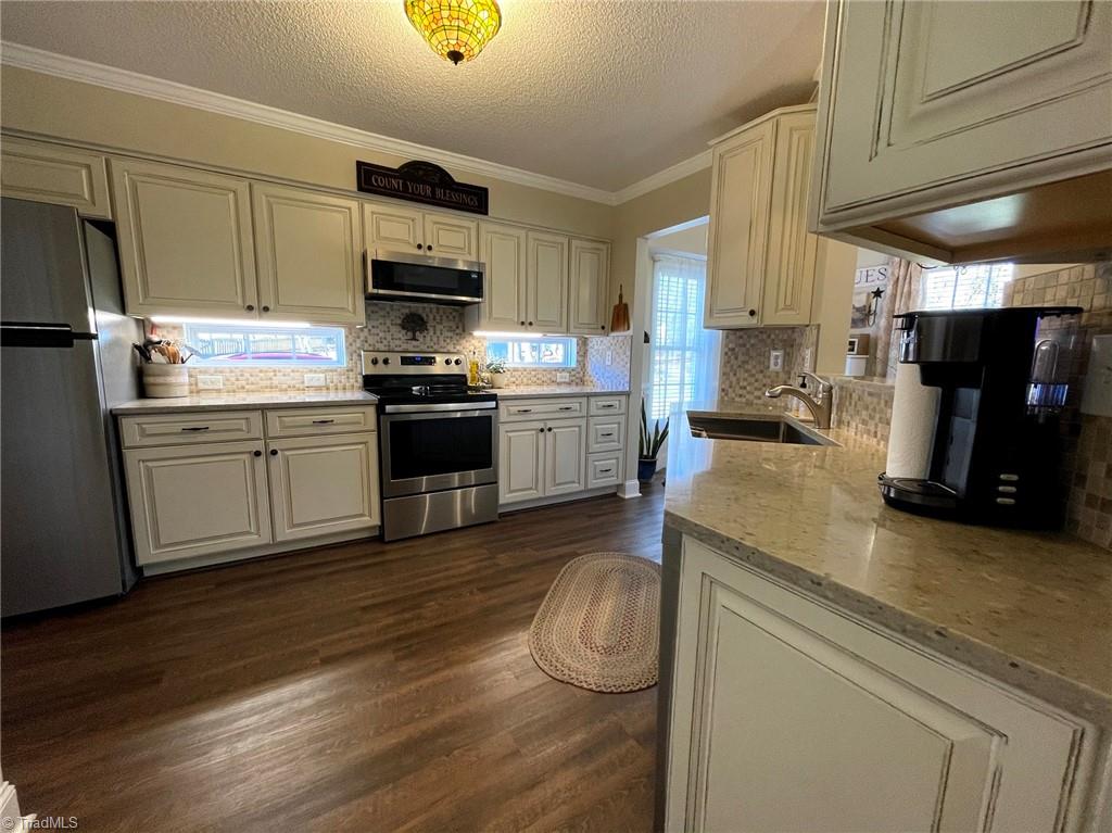 871 Ridge View Terrace Rural Hall, NC 27045 - Photo 18 of 49 New Cabinets, quartz counter tops and appliances 2019.