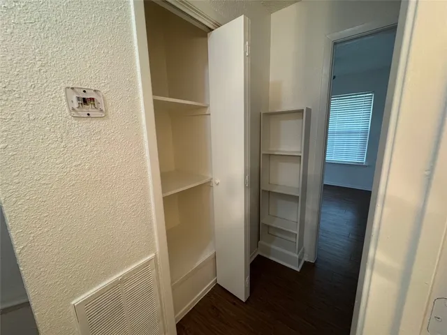 a view of a wooden fence