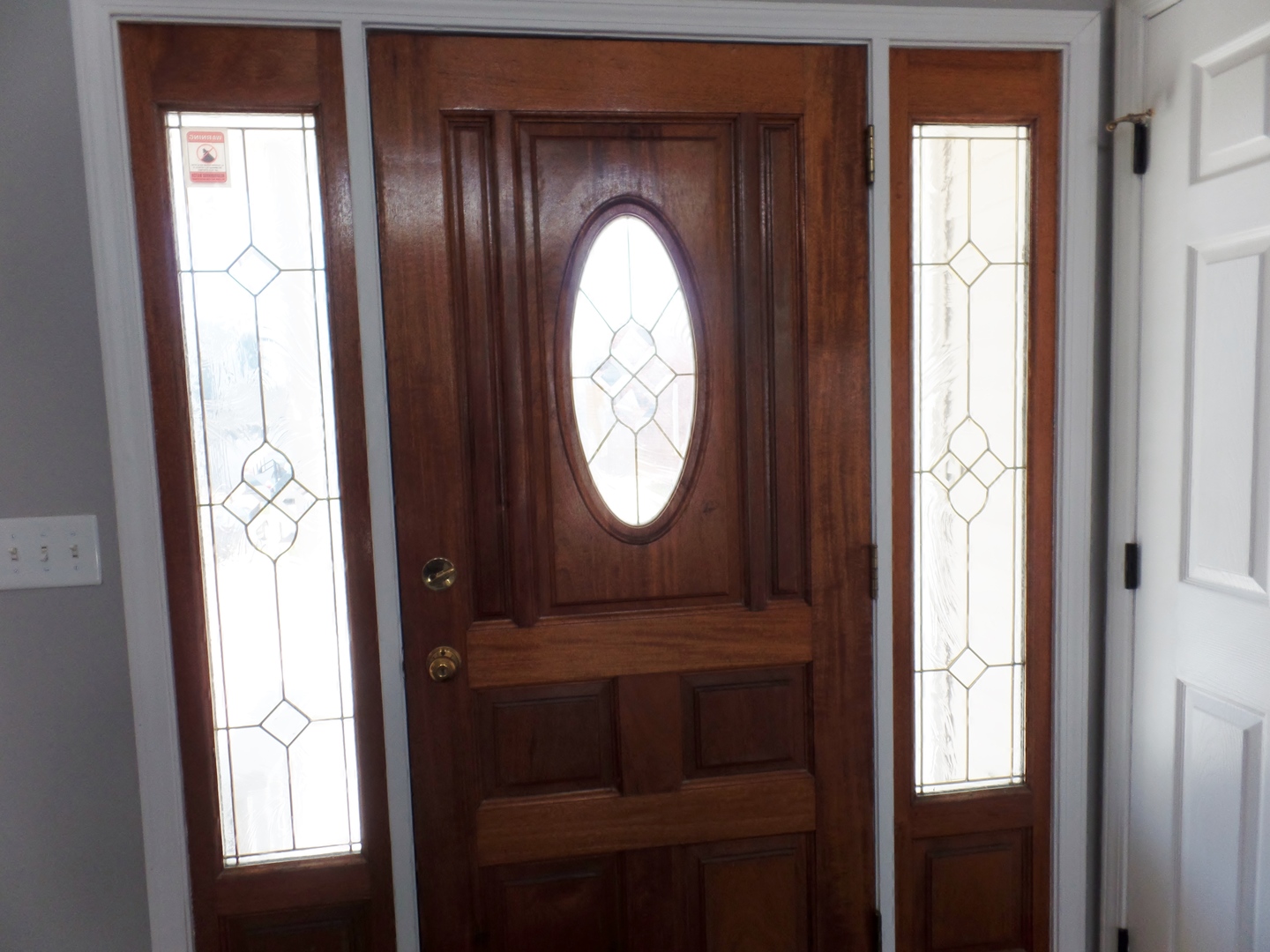 1504 Comanche Drive Bolingbrook, IL 60490 - Photo 2 of 34 a view of a entryway door with a mirror