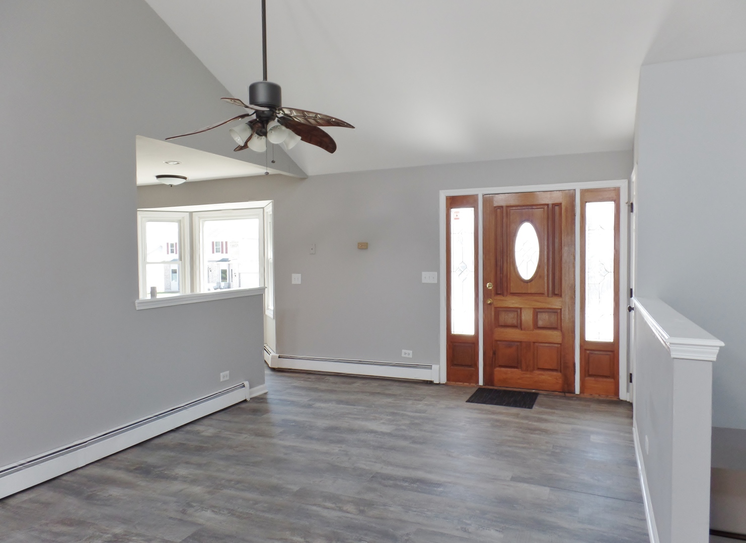 1504 Comanche Drive Bolingbrook, IL 60490 - Photo 3 of 34 wooden floor in an empty room with a window