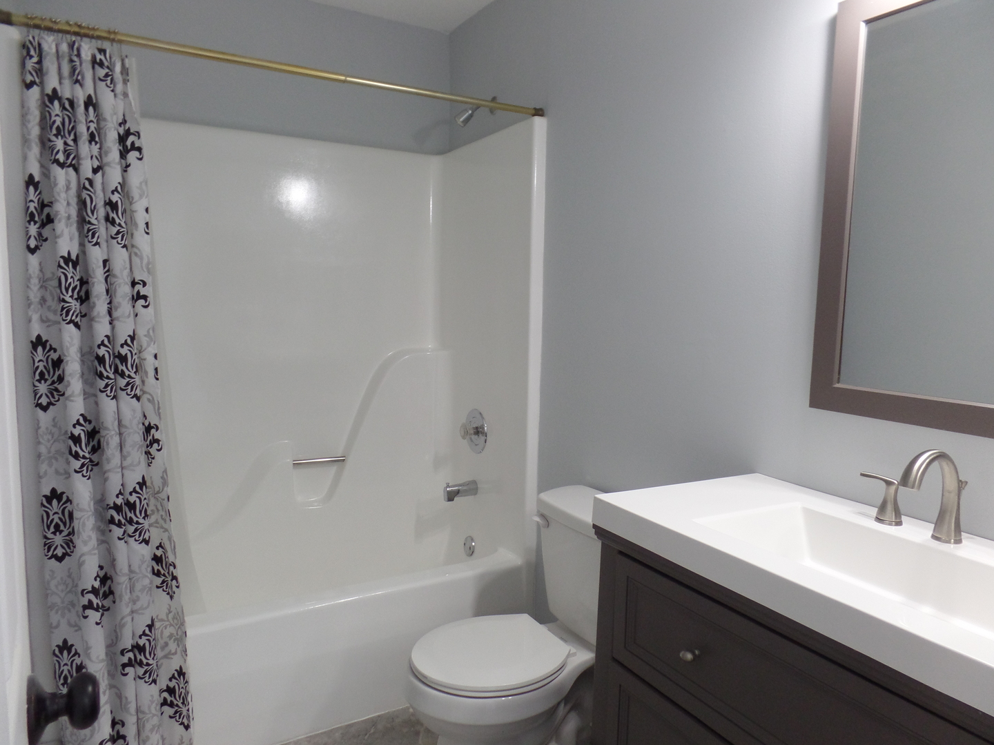 1504 Comanche Drive Bolingbrook, IL 60490 - Photo 24 of 34 a bathroom with a granite countertop sink toilet and shower