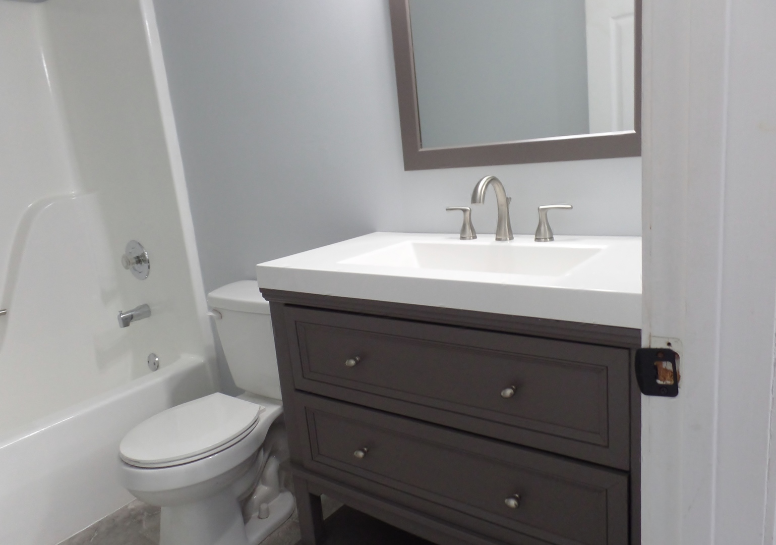 1504 Comanche Drive Bolingbrook, IL 60490 - Photo 25 of 34 a bathroom with a sink a toilet and shower
