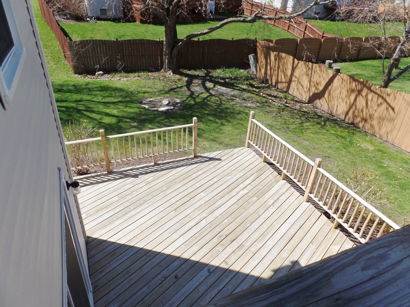 1504 Comanche Drive Bolingbrook, IL 60490 - Photo 30 of 34 a view of a wooden deck with chairs