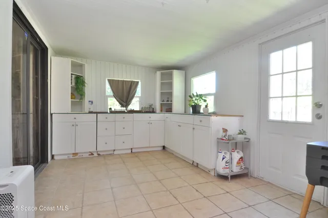 a bathroom with a sink toilet and mirror