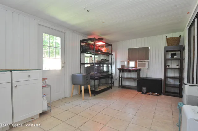 a workspace with furniture and window