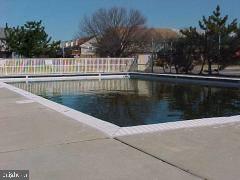 0 Edward Taylor Road, Unit 35 Ocean City, MD 21842 - Photo 6 of 10 a view of swimming pool with a yard
