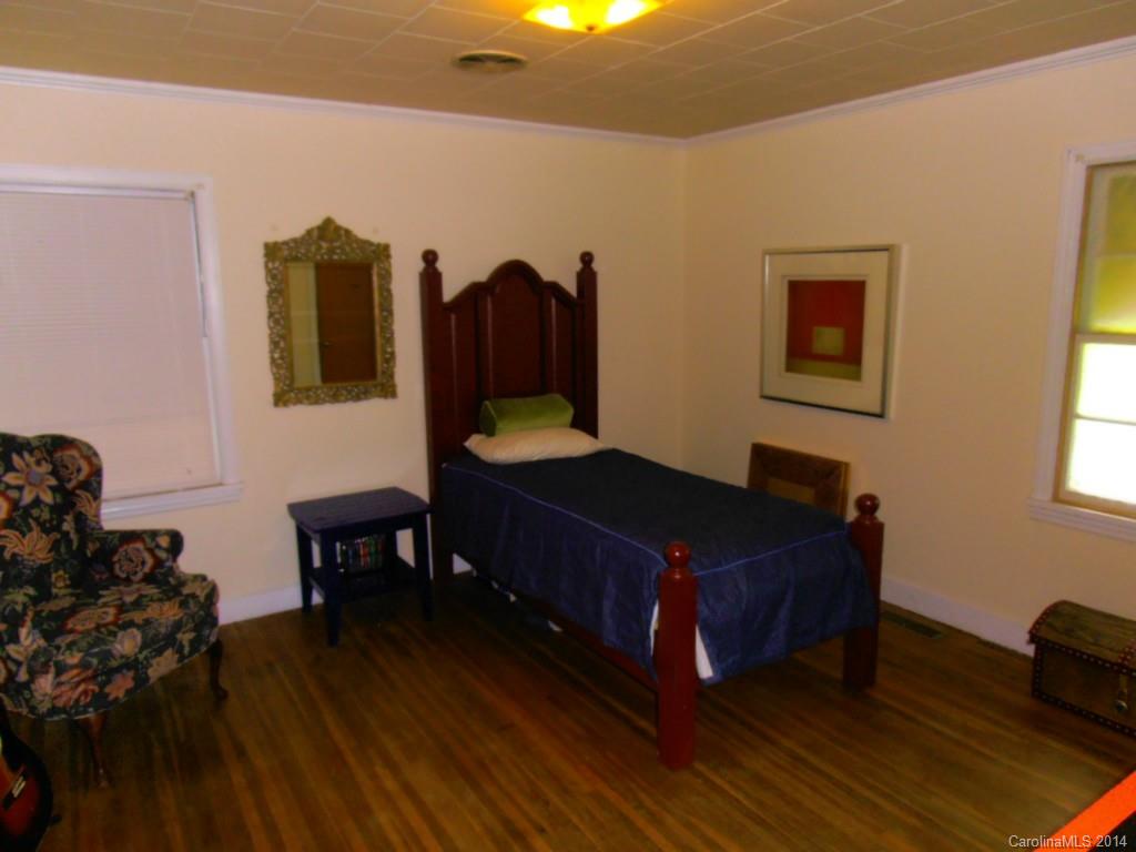 801 Marvin Road Waxhaw, NC 28173 - Photo 7 of 15 a living room with furniture and a wooden floor
