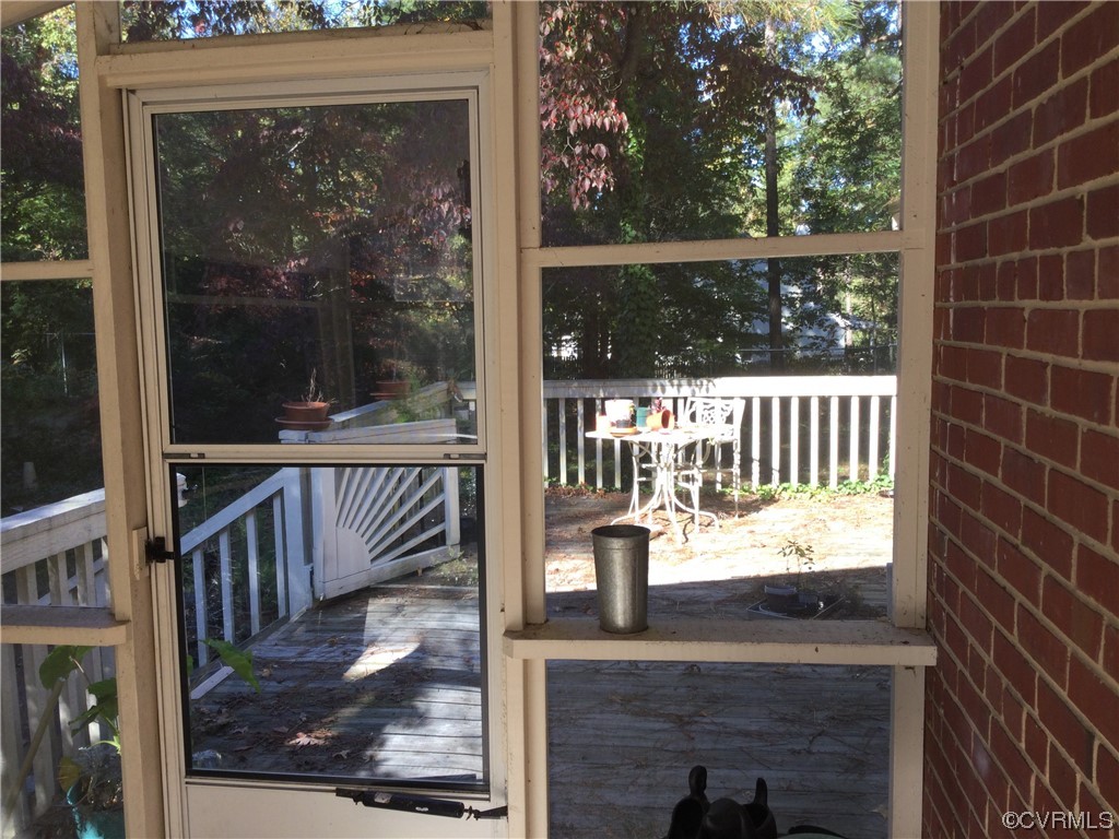 236 Buford Road Richmond, VA 23235 - Photo 12 of 42 a view of a porch with a bench