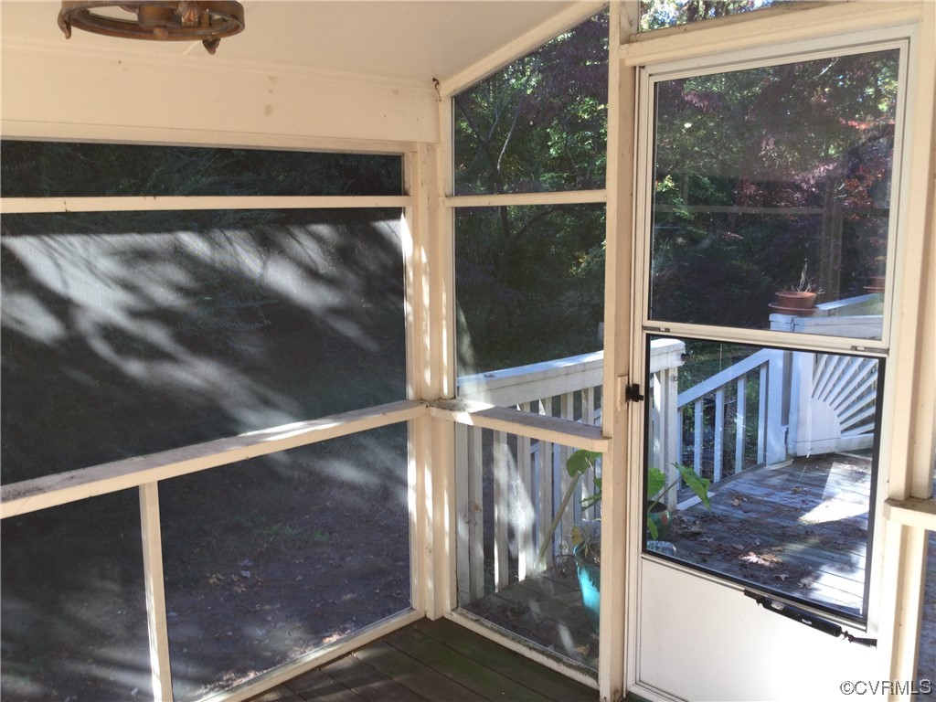 236 Buford Road Richmond, VA 23235 - Photo 13 of 42 a view of balcony with a floor to ceiling window and wooden floor