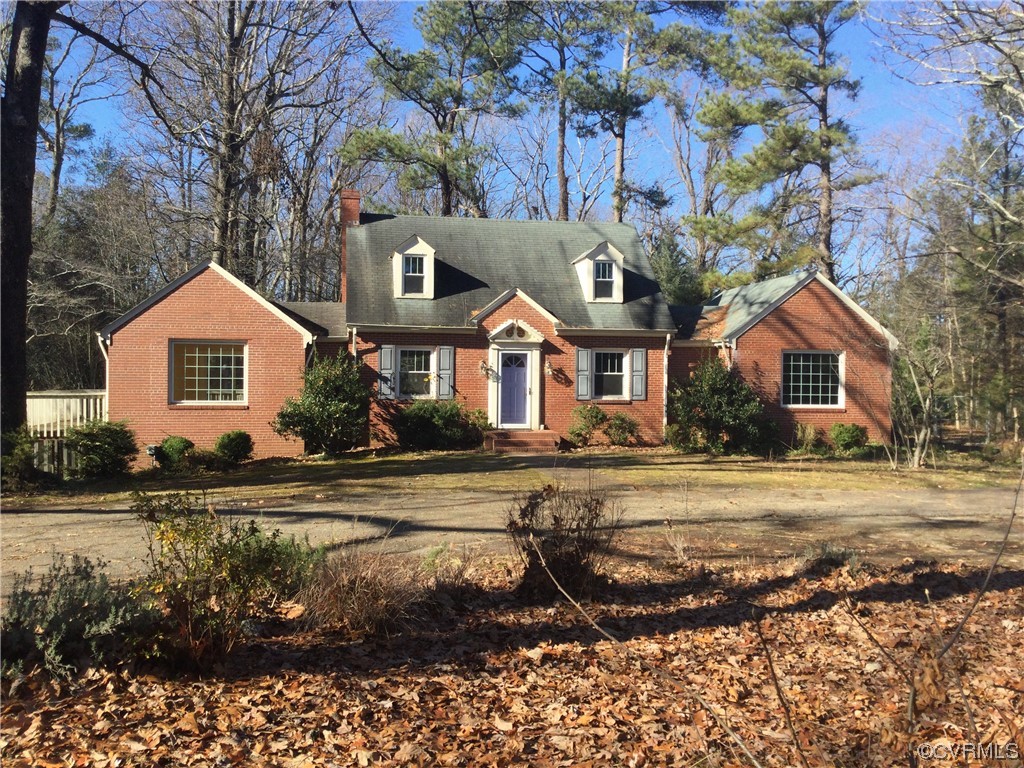236 Buford Road Richmond, VA 23235 - Photo 2 of 42 a front view of a house with a yard