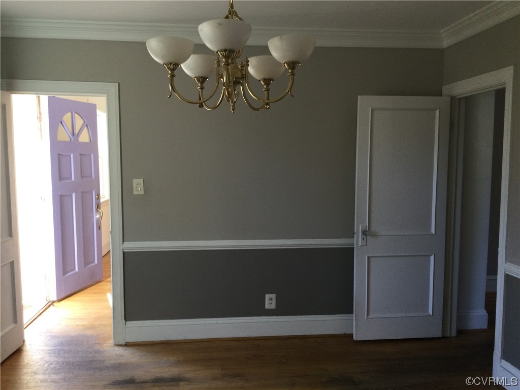 236 Buford Road Richmond, VA 23235 - Photo 25 of 42 a view of dinning room with wooden floor and chandelier