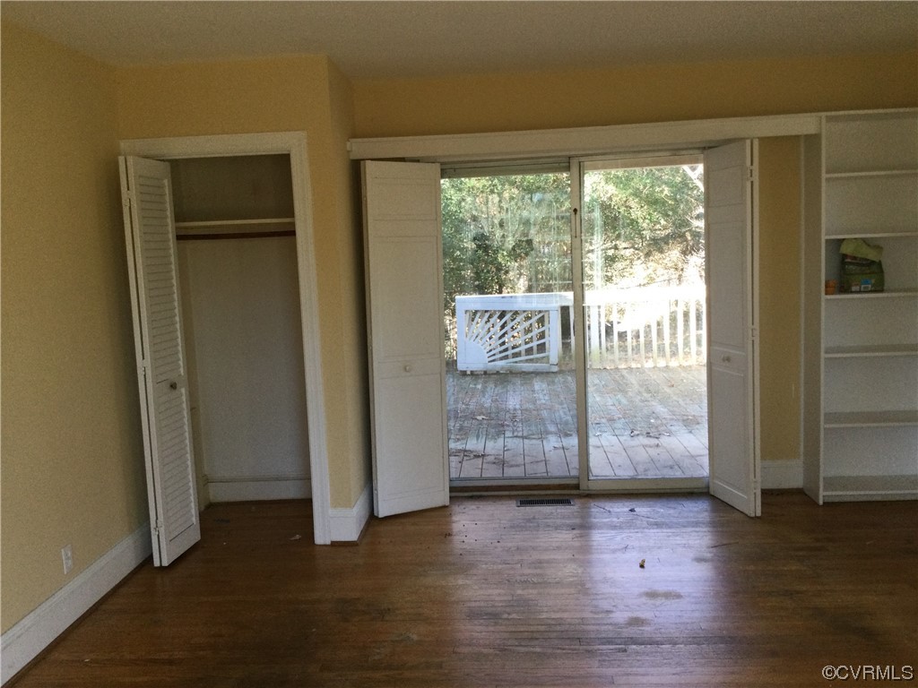 236 Buford Road Richmond, VA 23235 - Photo 29 of 42 a view of front door and wooden floor