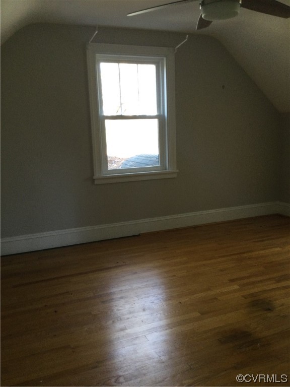 236 Buford Road Richmond, VA 23235 - Photo 39 of 42 an empty room with wooden floor and windows