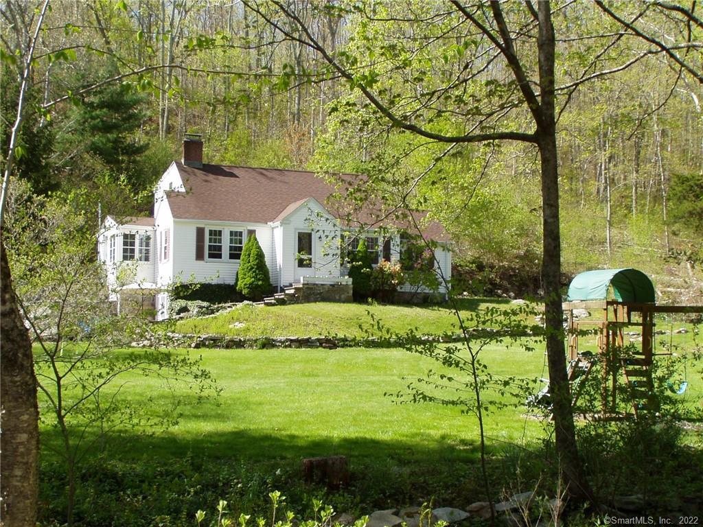 2203 Durham Road Madison, CT 06443 - Photo 1 of 1 a view of a house with a big yard plants and large trees
