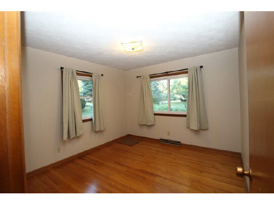 1813 Warren Road Rockford, IL 61108 - Photo 8 of 11 a view of empty room with window