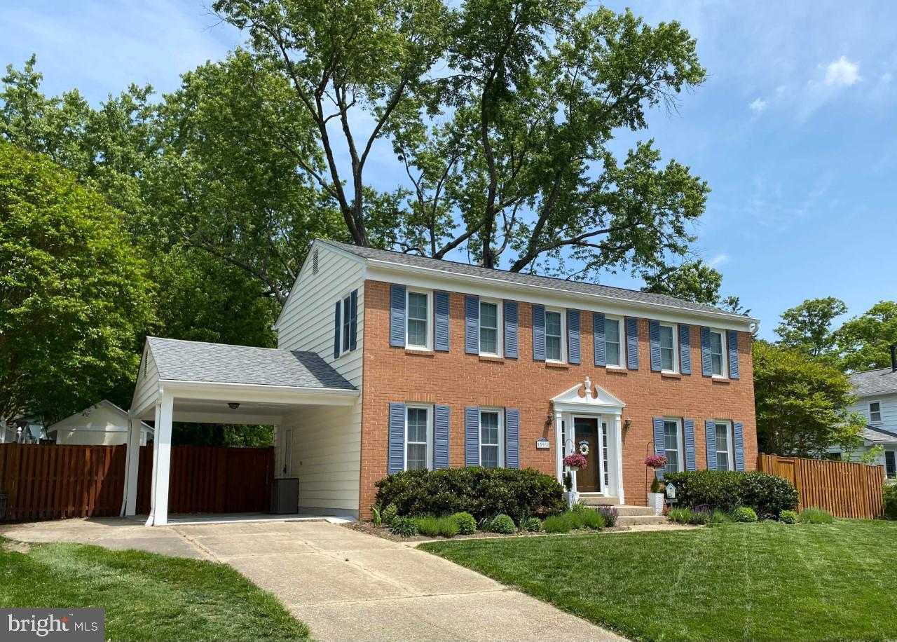 15918 Jerald Road Laurel, MD 20707 - Photo 1 of 40 a front view of a house with a yard and garage
