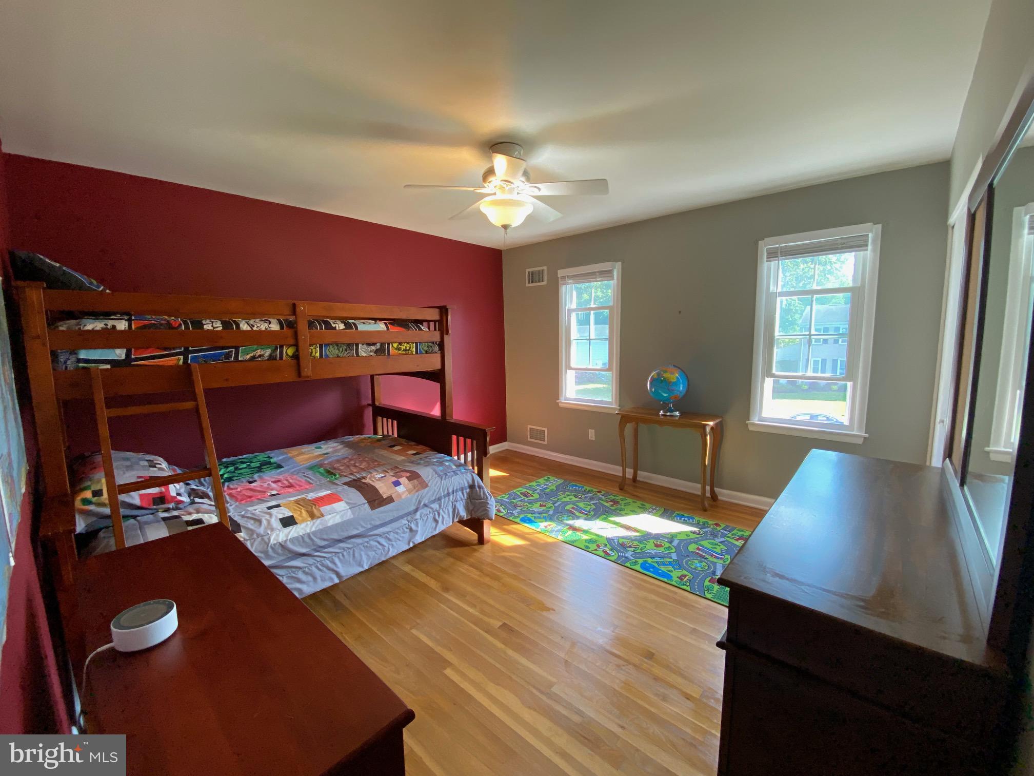 15918 Jerald Road Laurel, MD 20707 - Photo 25 of 40 a living room with furniture and a dining table