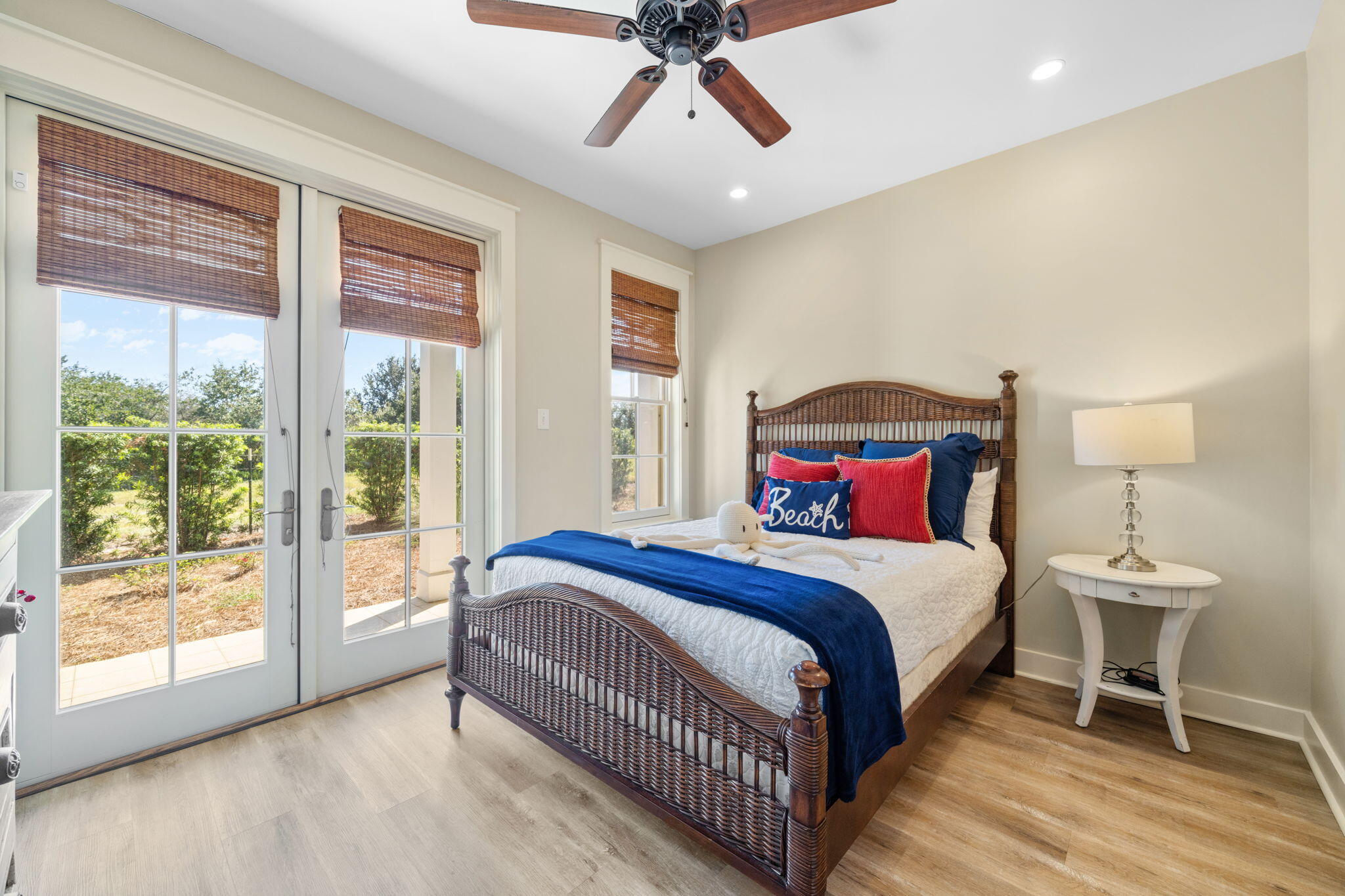 255 Cypress Drive Santa Rosa Beach, FL 32459 - Photo 13 of 81 a bedroom with a bed and a large window