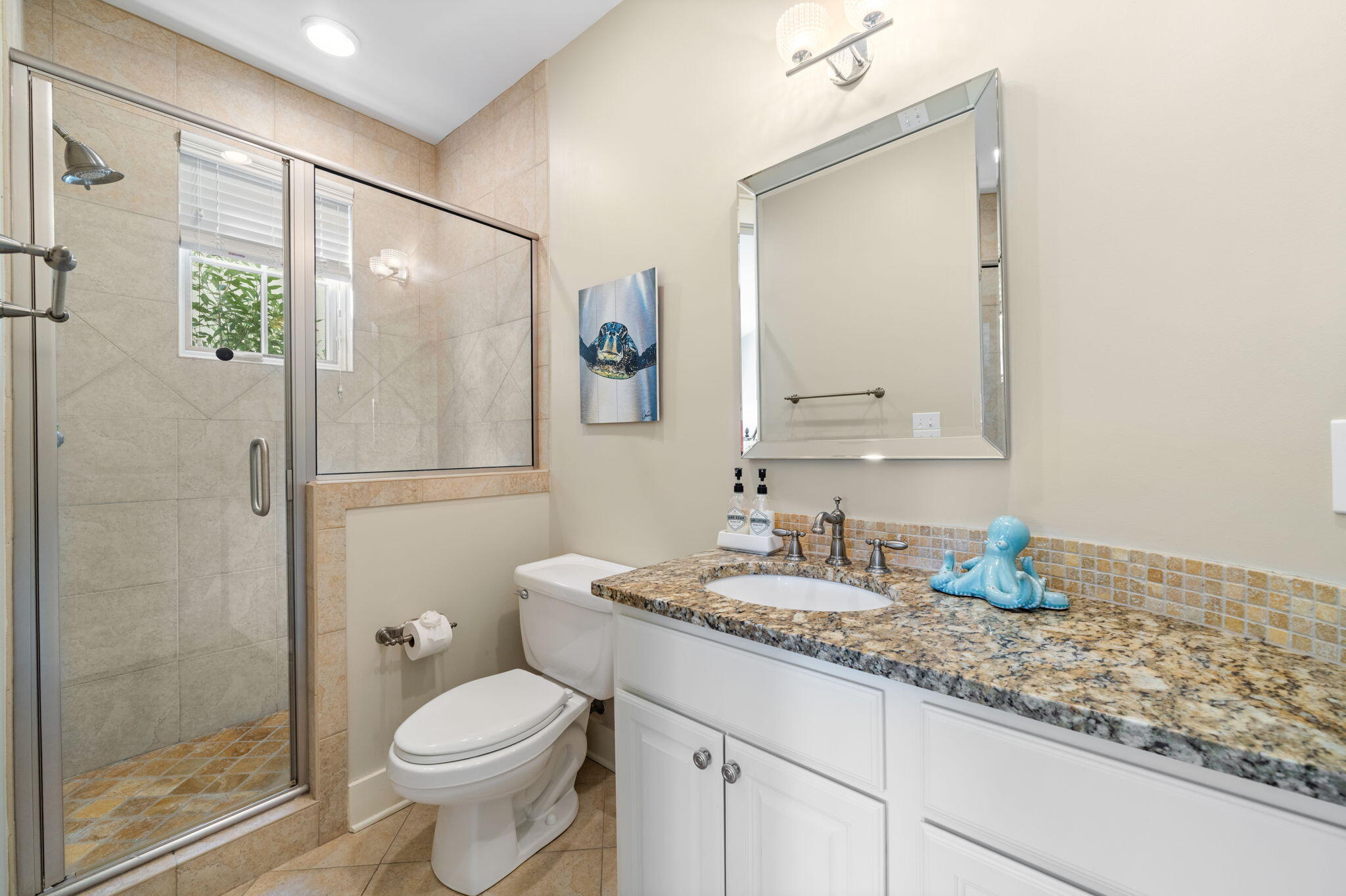 255 Cypress Drive Santa Rosa Beach, FL 32459 - Photo 18 of 81 a bathroom with a granite countertop sink toilet and shower