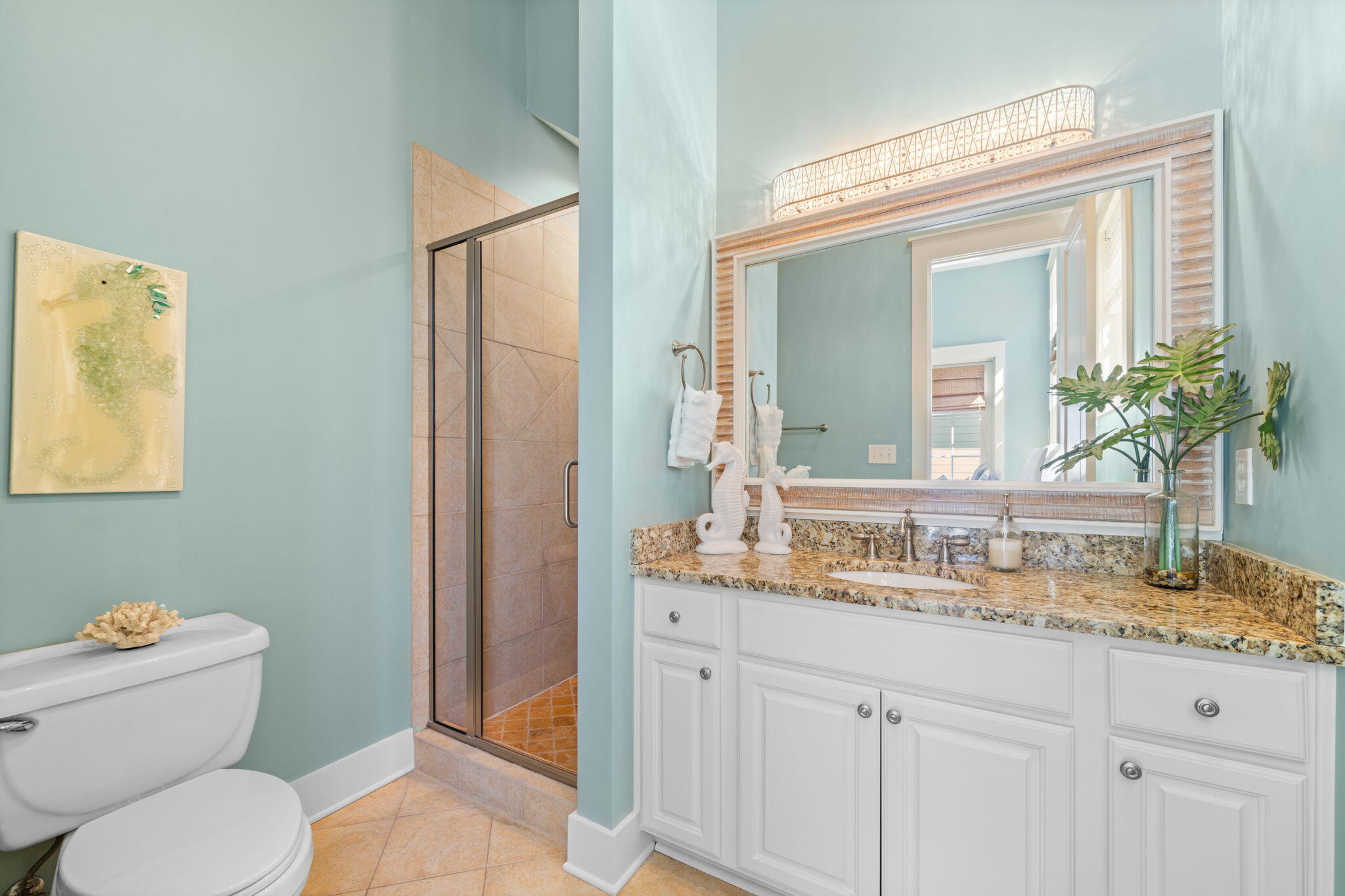 255 Cypress Drive Santa Rosa Beach, FL 32459 - Photo 21 of 81 a bathroom with a granite countertop sink mirror vanity and toilet
