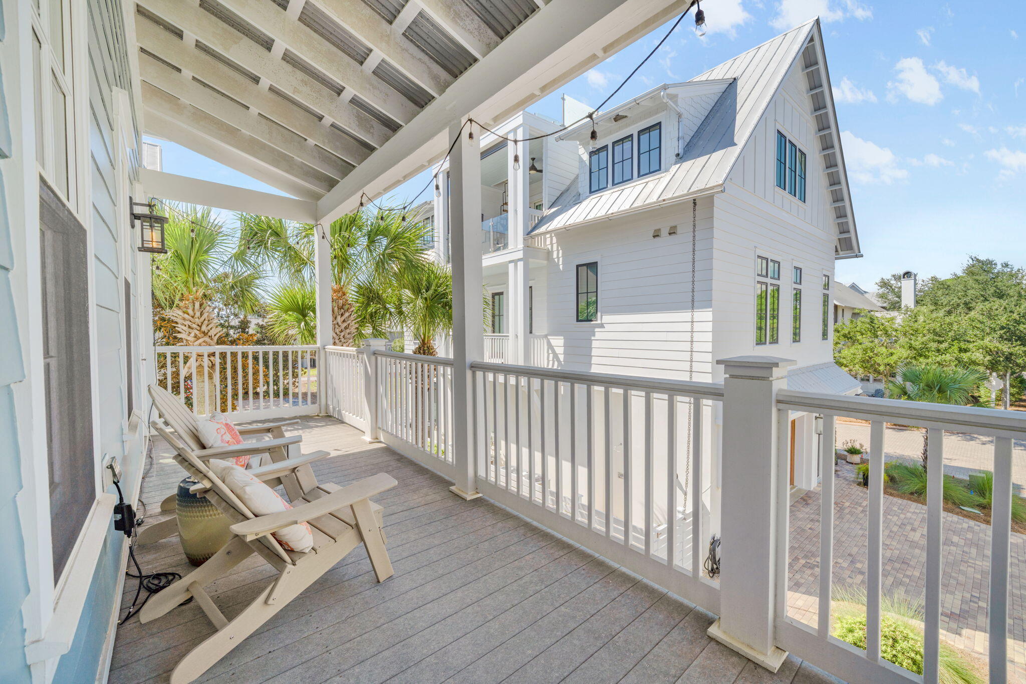 255 Cypress Drive Santa Rosa Beach, FL 32459 - Photo 24 of 81 a view of a chair and table in the balcony