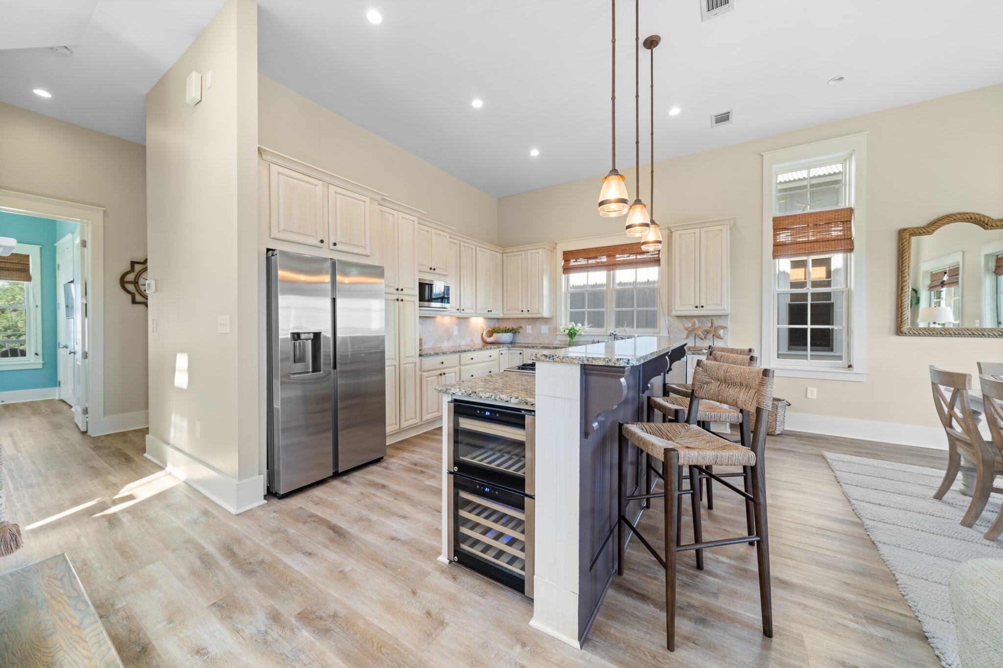 255 Cypress Drive Santa Rosa Beach, FL 32459 - Photo 28 of 81 a kitchen with stainless steel appliances kitchen island granite countertop a refrigerator and a stove top oven