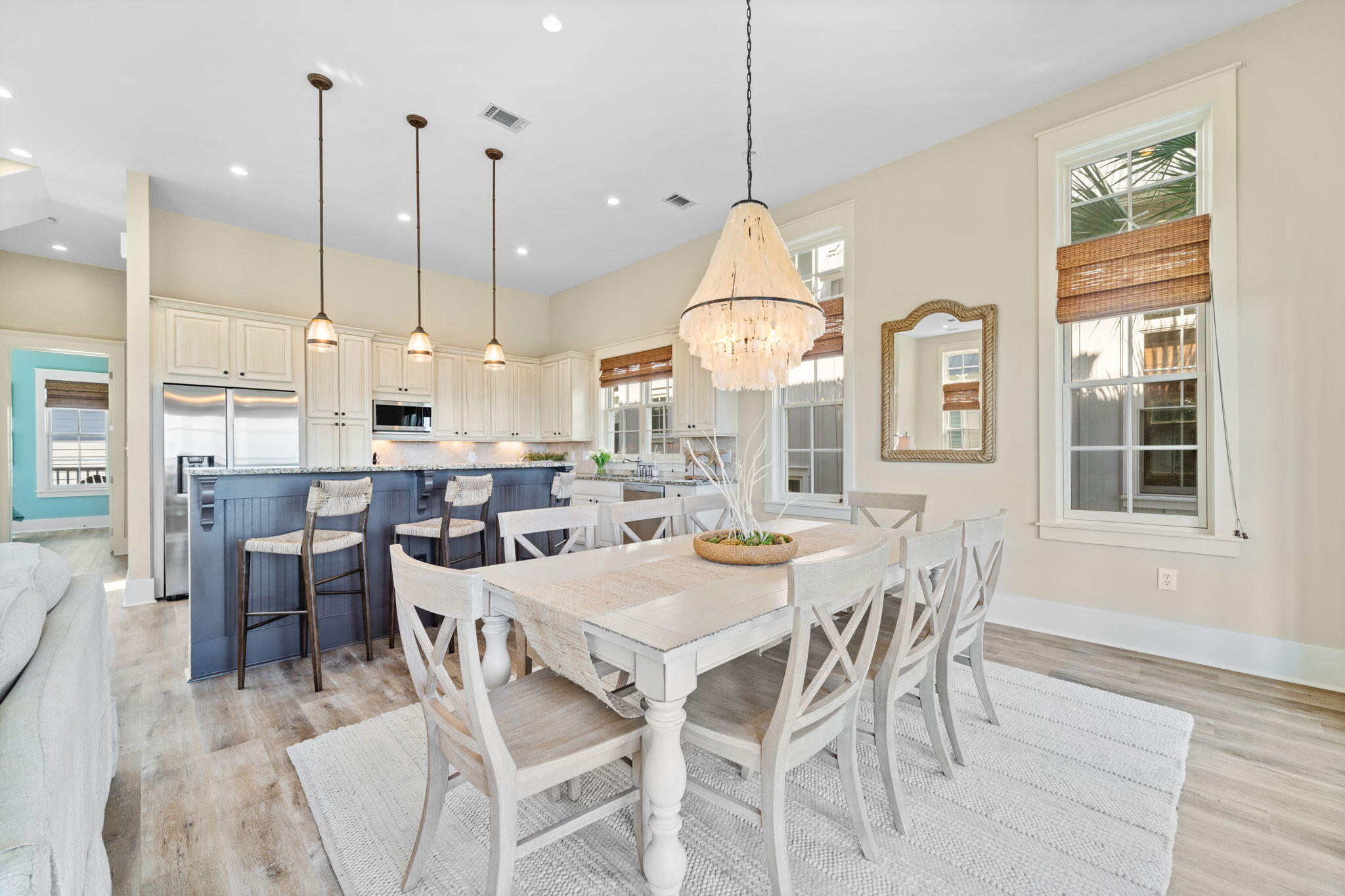 255 Cypress Drive Santa Rosa Beach, FL 32459 - Photo 36 of 81 a view of a dining room and livingroom with furniture wooden floor a chandelier
