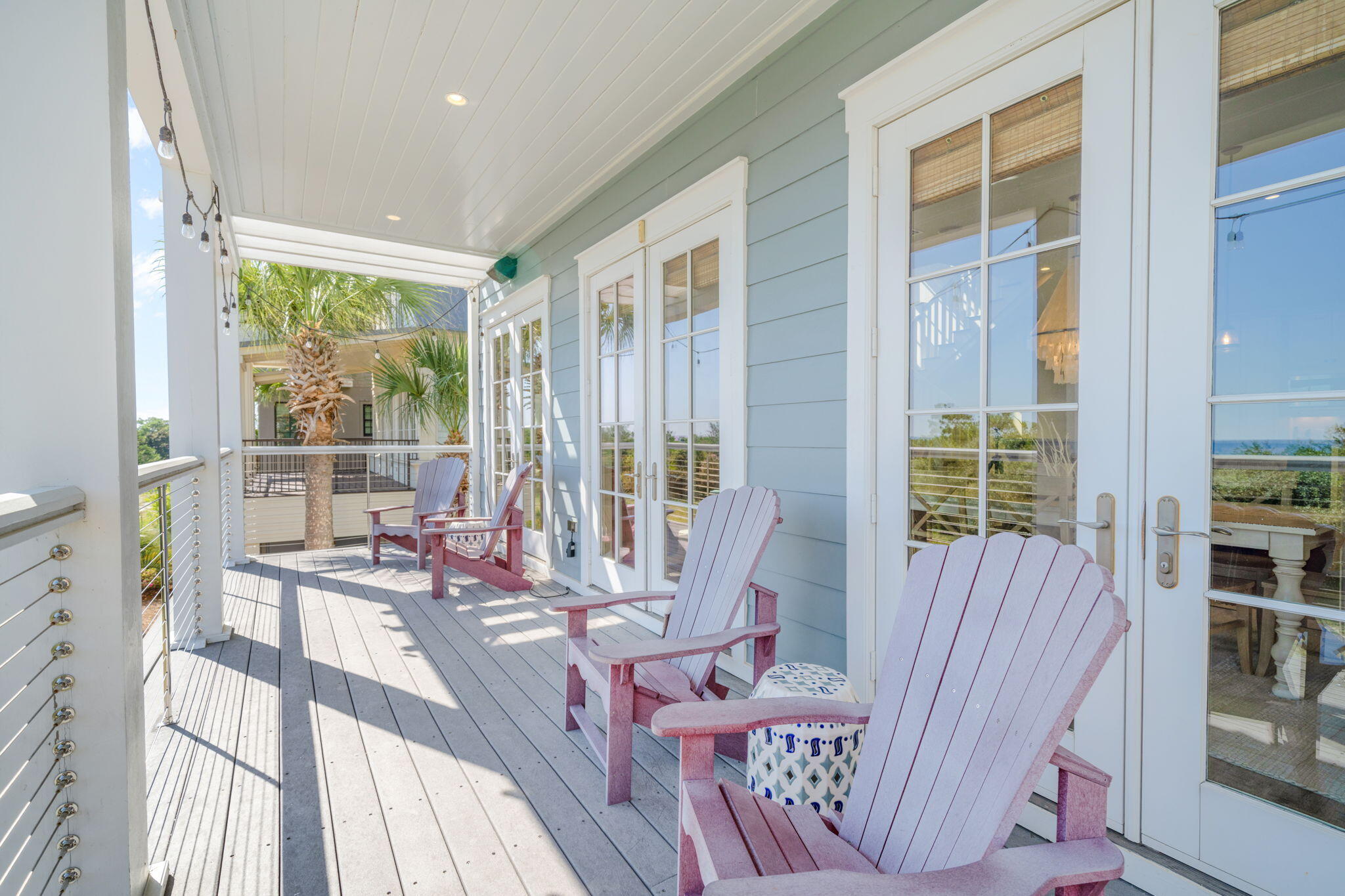 255 Cypress Drive Santa Rosa Beach, FL 32459 - Photo 43 of 81 a view of a living room with furniture and floor to ceiling windows