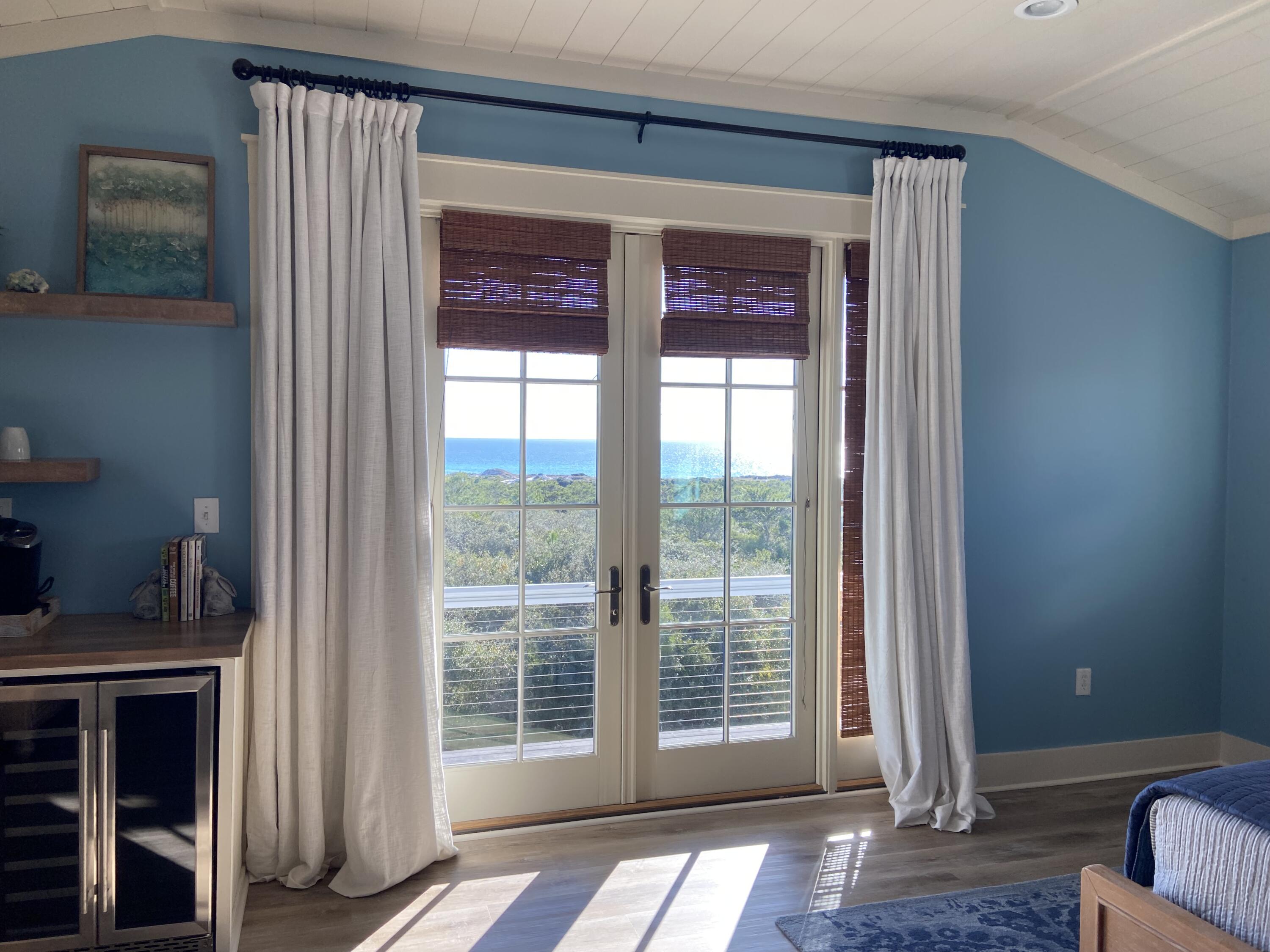 255 Cypress Drive Santa Rosa Beach, FL 32459 - Photo 81 of 81 a view of empty room with wooden floor and fan