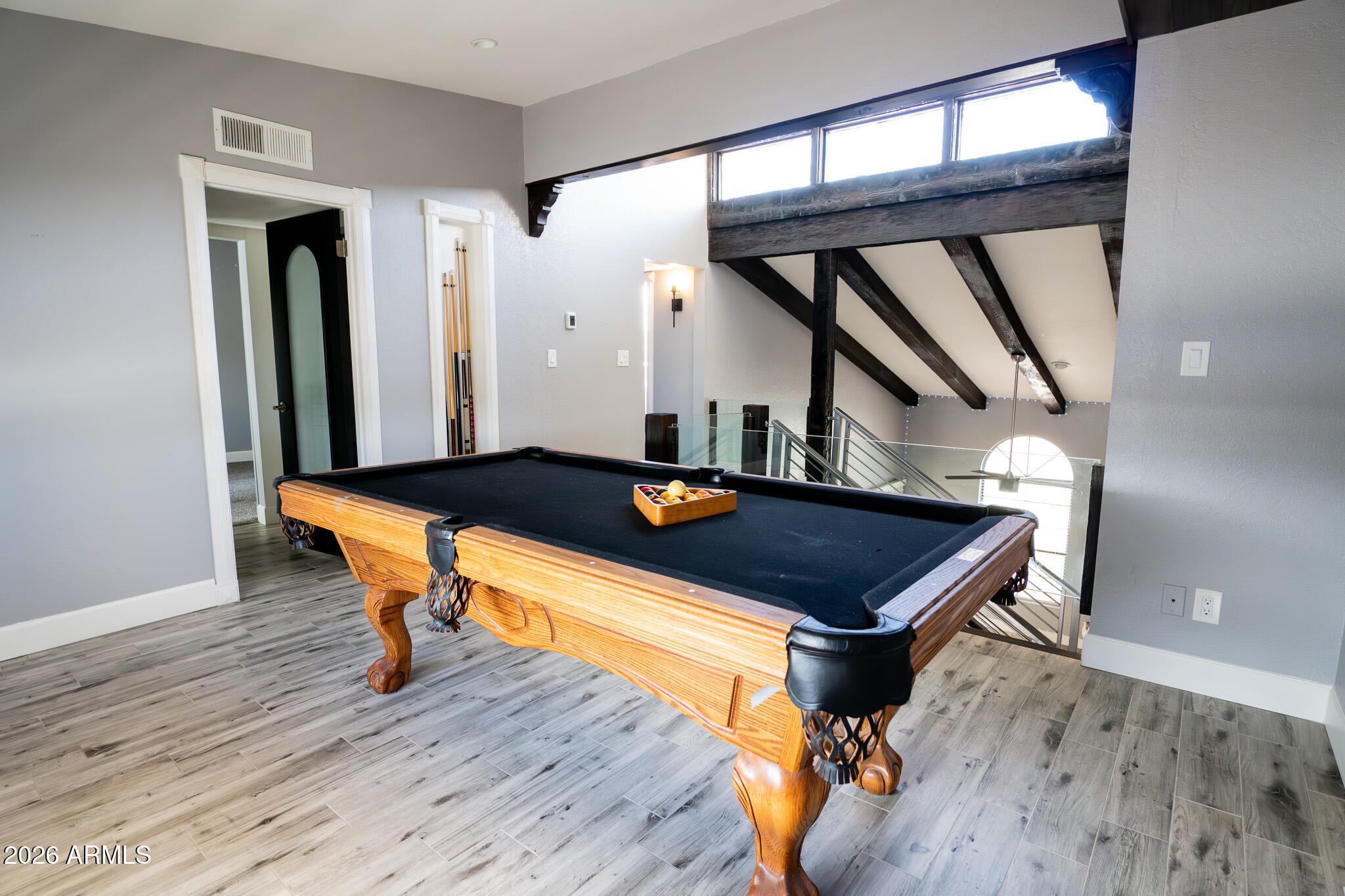 5100 North Miller Road, Unit 3 Scottsdale, AZ 85250 - Photo 21 of 31 a room with wooden floor pool table and chairs